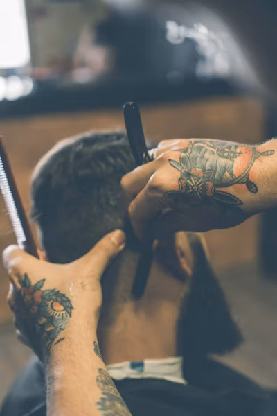 Man with textured crop hairstyle featuring short sides and textured top