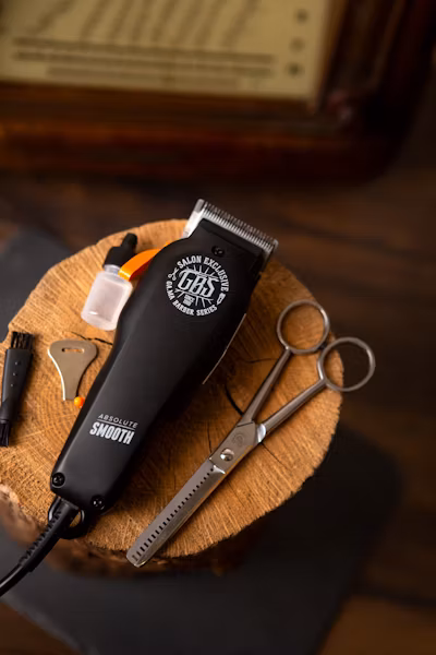 Child getting a haircut at barbershop